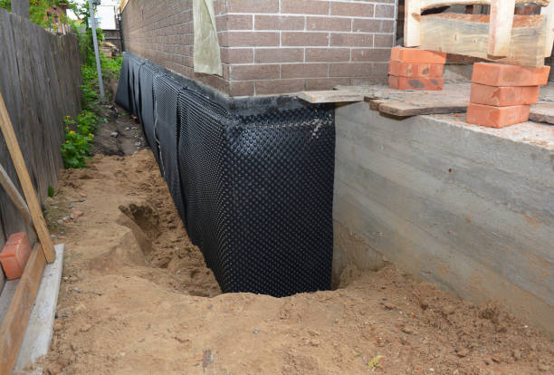 Happy homeowners after waterproofing job in Commerce Township